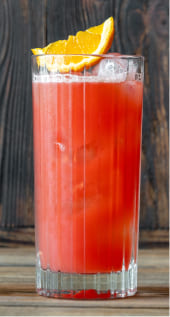 A glass with a straw filled with a red liquid